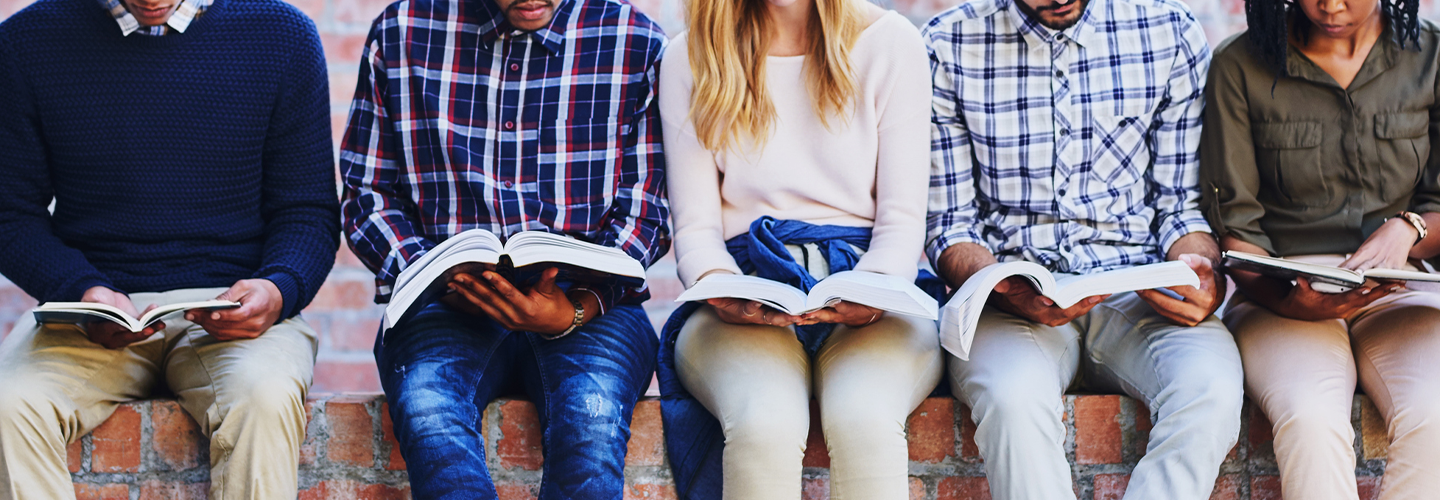 Group of Students Reading Textbooks