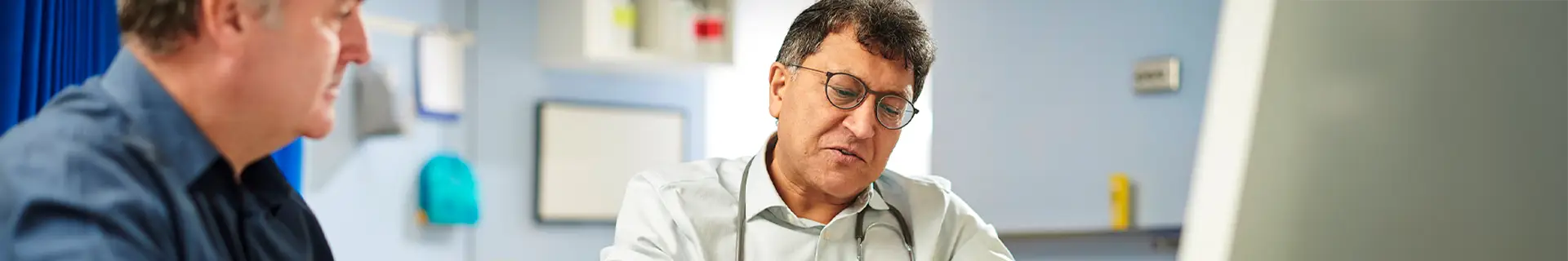 Middle Aged Man at Doctor